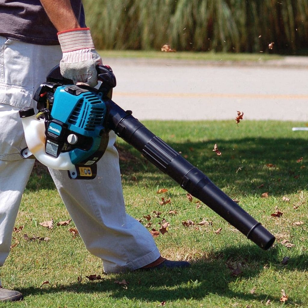 person using Makita BHX2500CA MM4 4-Stroke Engine Blower