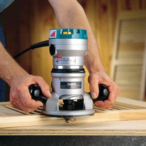 person using Makita RF1101 Router