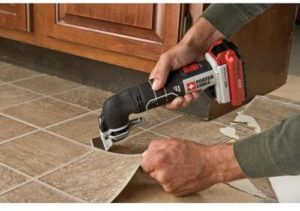person using PORTER-CABLE PCC710B MAX Oscillating Tool