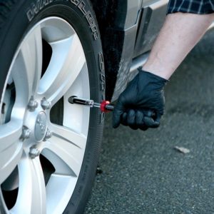 person using Performance Tool M194 Micro Torque Screwdriver