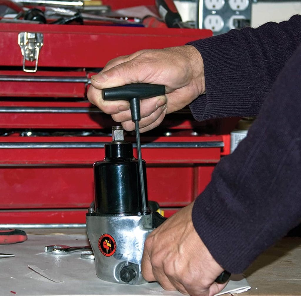 person using Performance Tool W80275 Metric T-Handle Hex Set