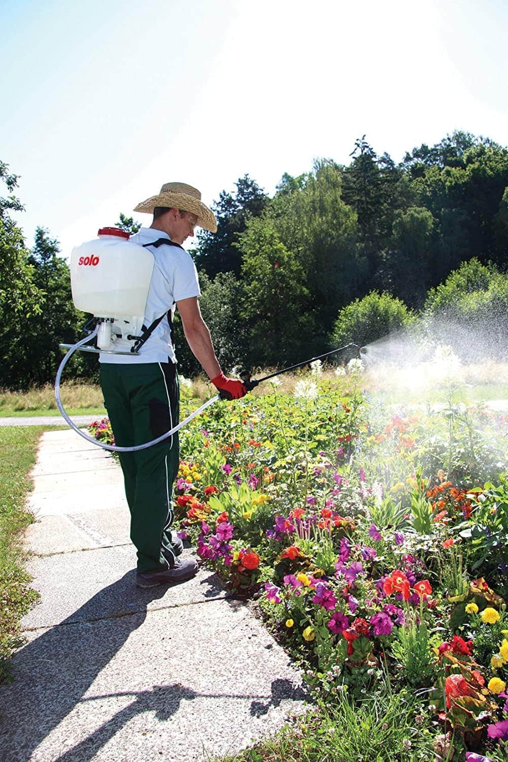 person using Solo 425 4-Gallon Professional Piston Backpack Sprayer