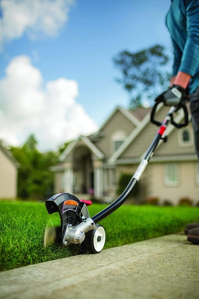 person using TrimmerPlus TPE720 Dual Edger
