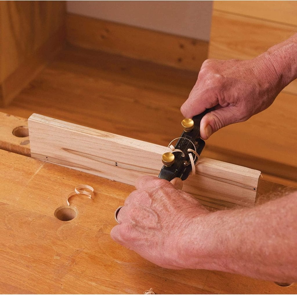 person using WoodRiver Adjustable Spoke Shave