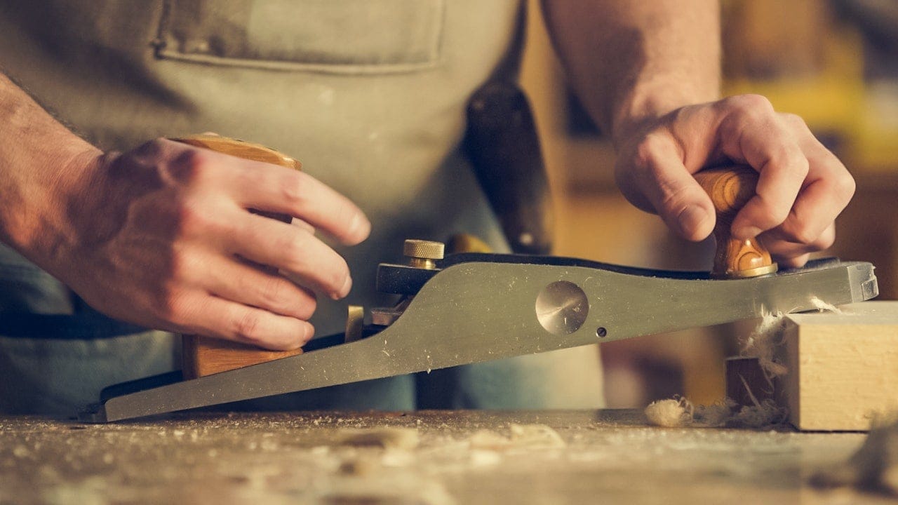 person using planer