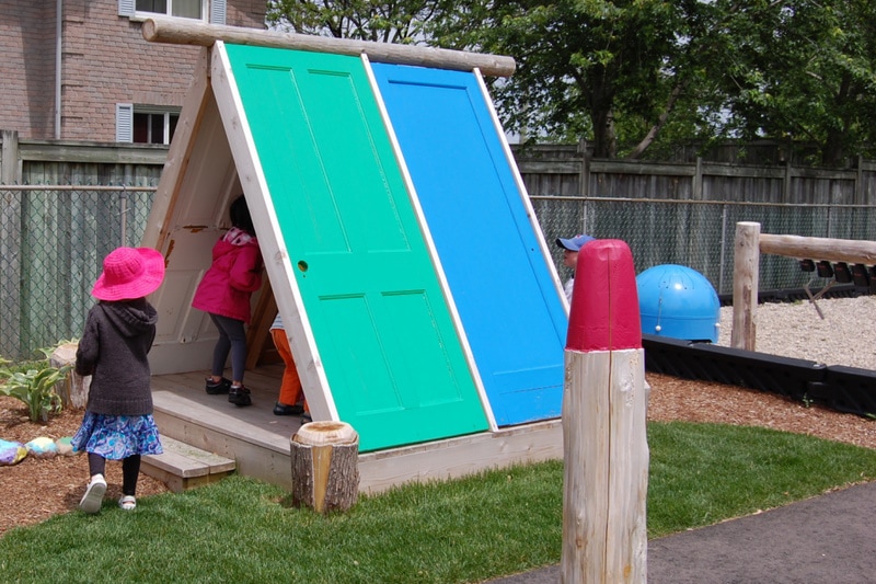 recycled door playhouse by earthscape playground DIY