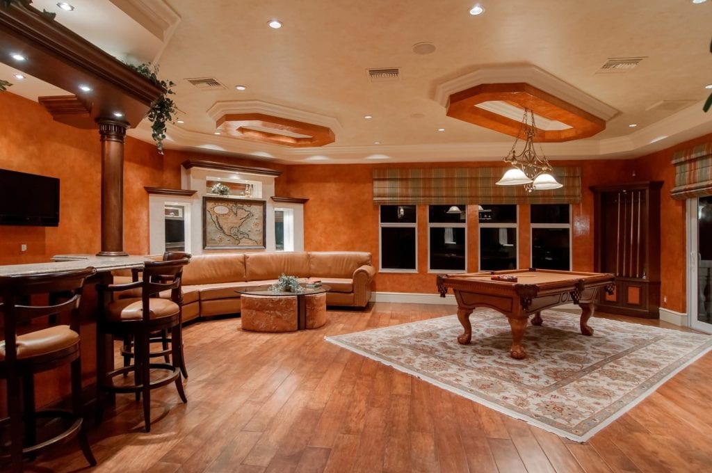 rustic recreation room in the basement