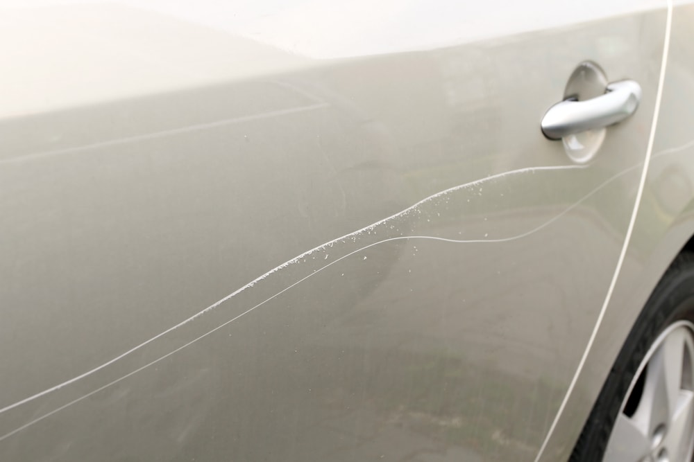 key scratch on silver car