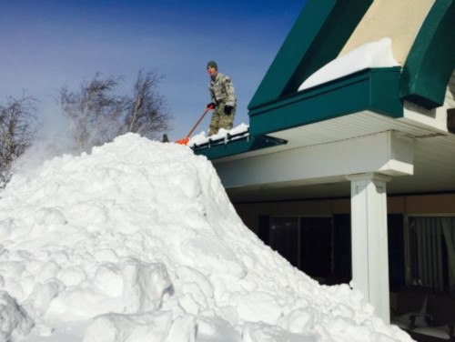 snow removing on roof