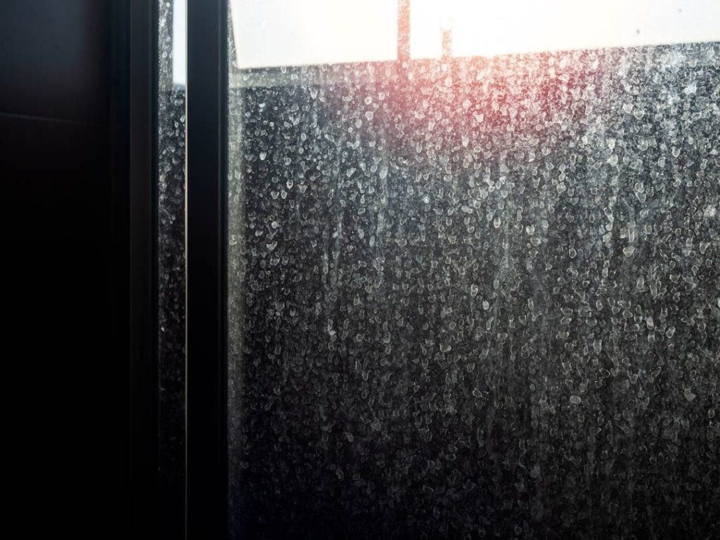 soap scum on bathroom door
