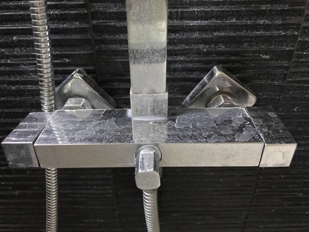 soap scum on metal faucet