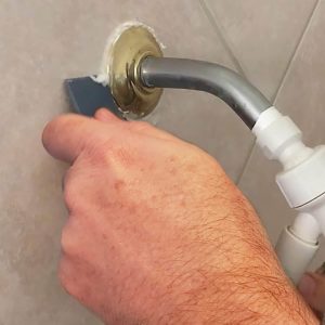 using Crown Tuff Strip Ultimate Caulk Remover
