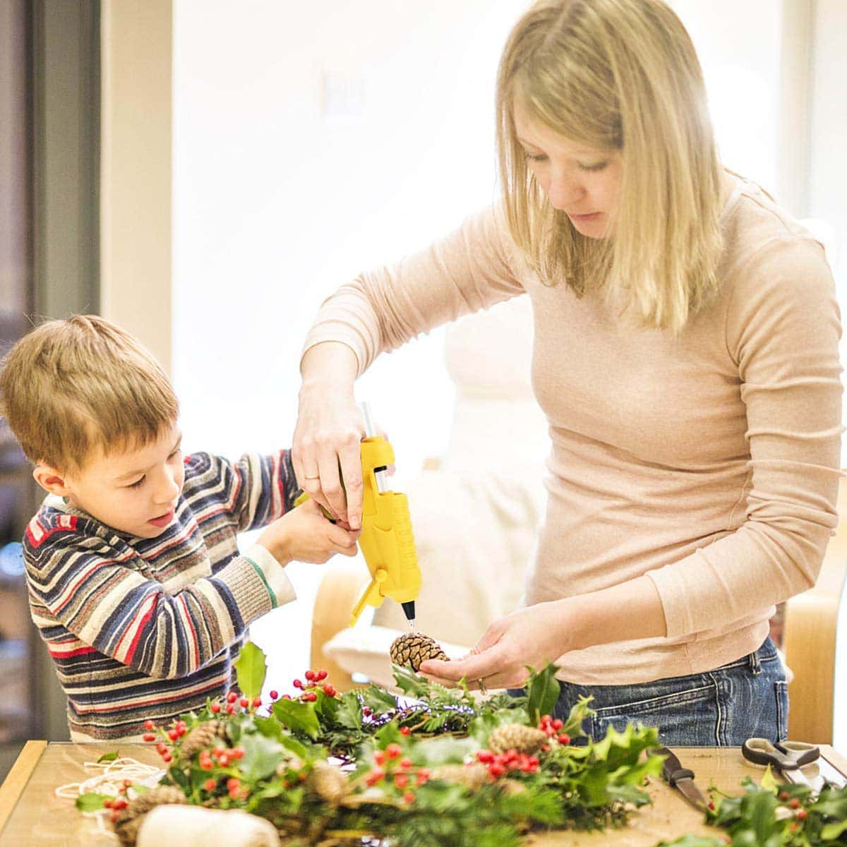 woman and child using AONOKOY Cordless Hot Glue Gun