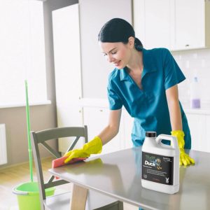 woman applying Tuff Duck Granite Sealer