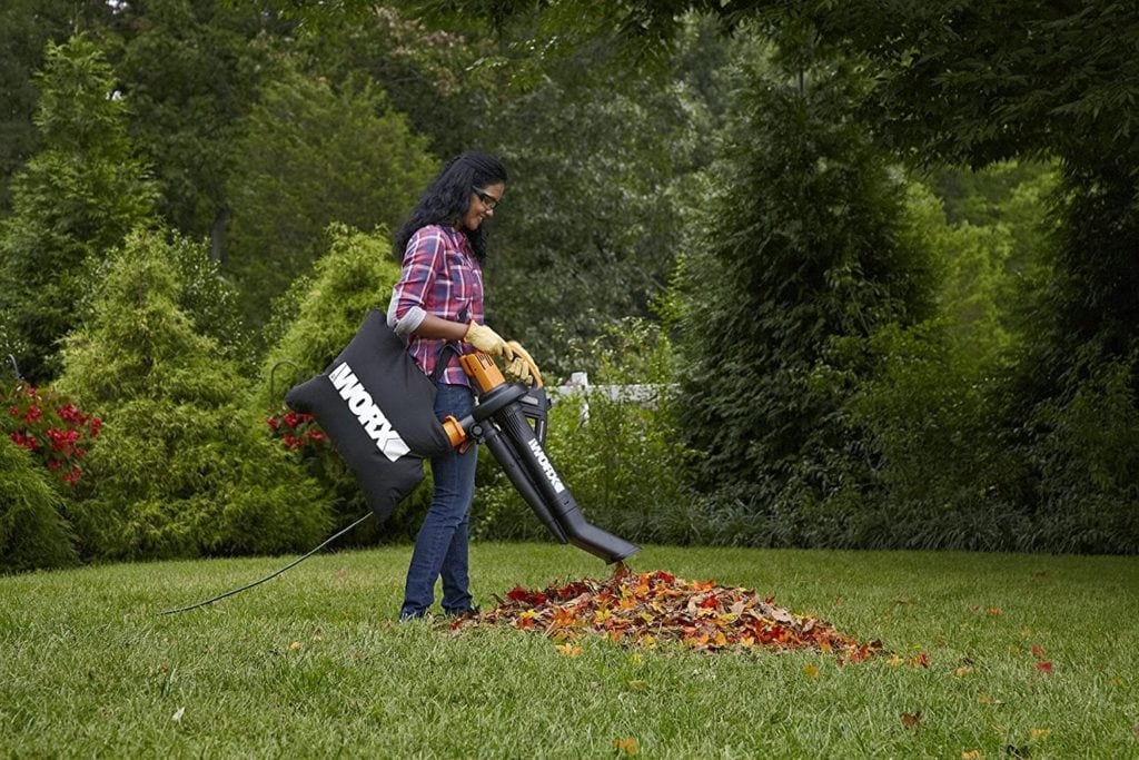 woman using WORX WG509 TRIVAC 12 Amp 3-In-1 Electric Blower