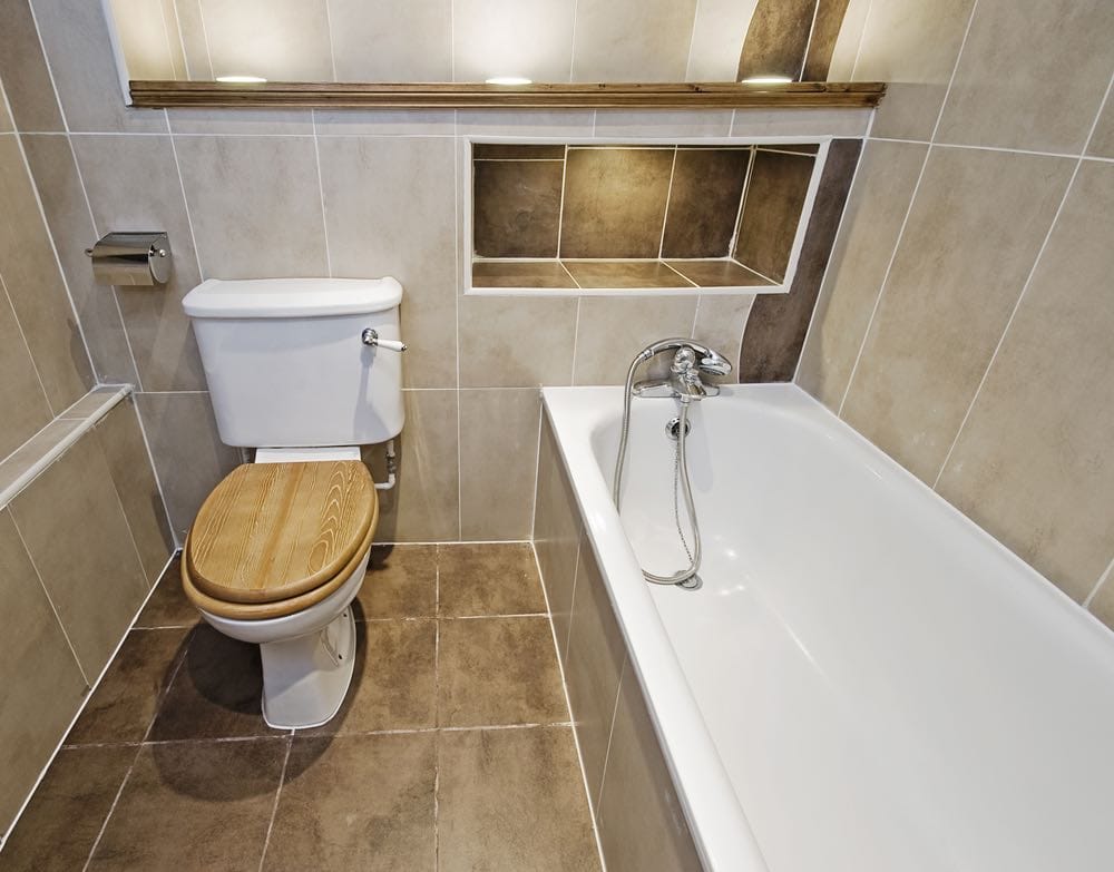 wooden toilet seat in bathroom