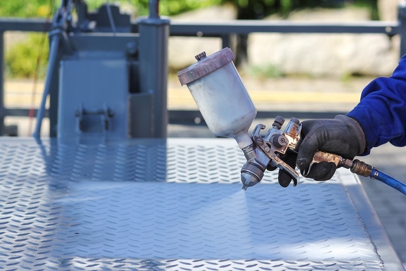 Working,With,Paint,Spray,Gun