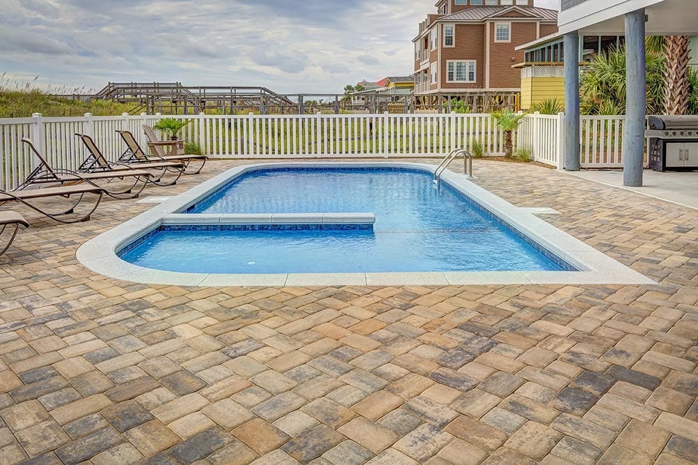 in ground pool in the backyard