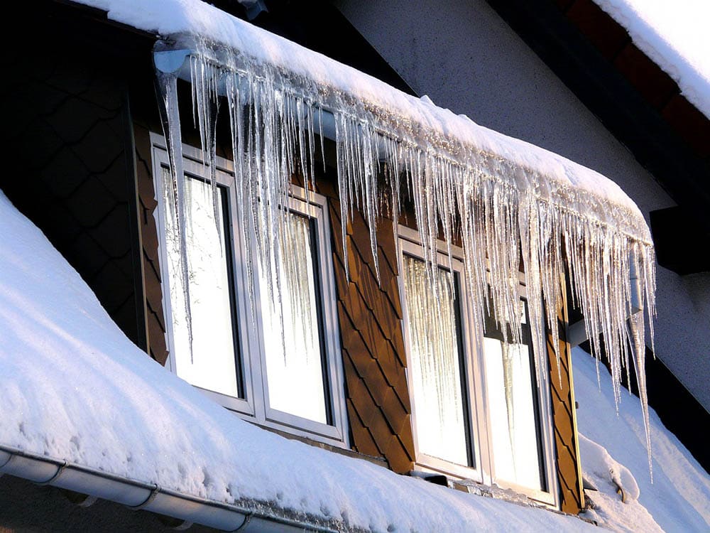 snow on the roof and windows