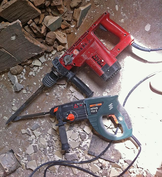 two hammer drills in the construction site