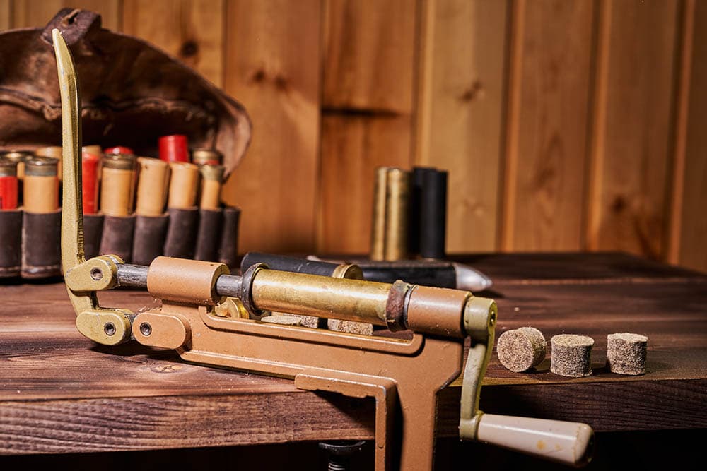 hunting equipment on reloading bench