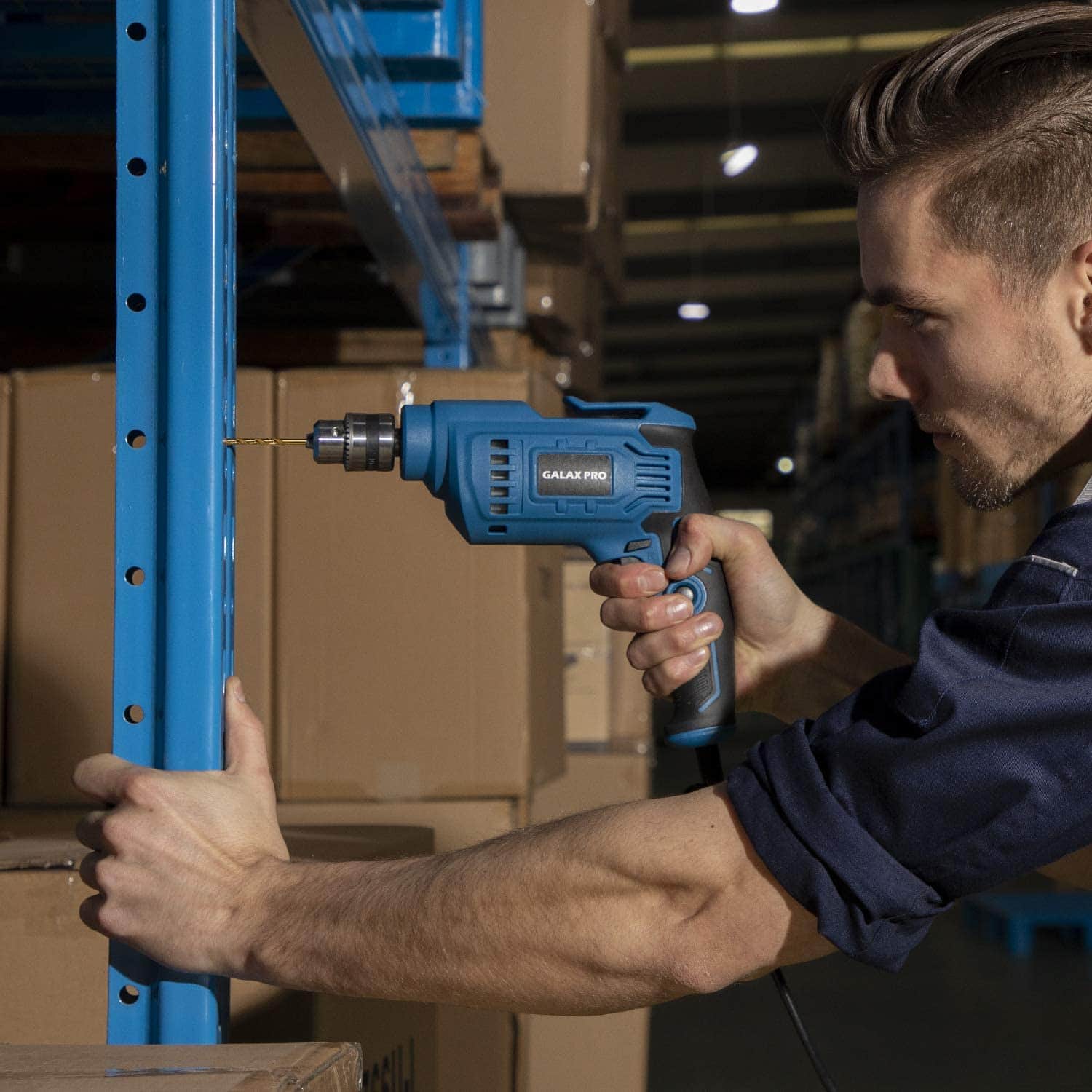 man using G LAXIA Corded Drill
