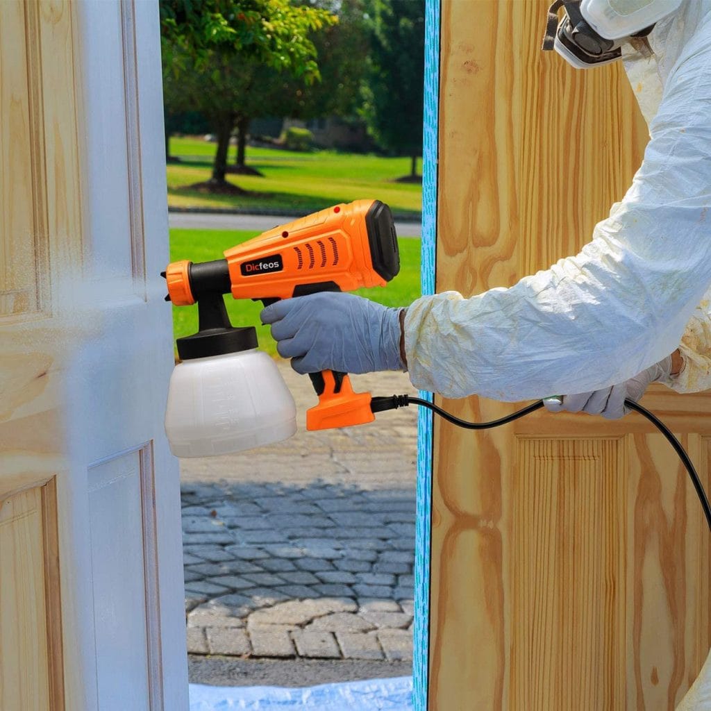 person using Dicfeos Paint Sprayer, 700W High Power HVLP Home Spray Gun