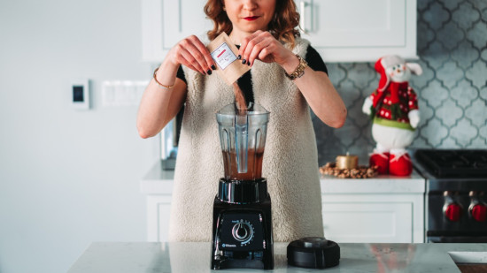 woman pouring chocolate powder