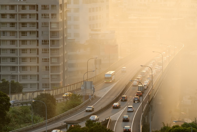 Air pollution scenic with cars on highway