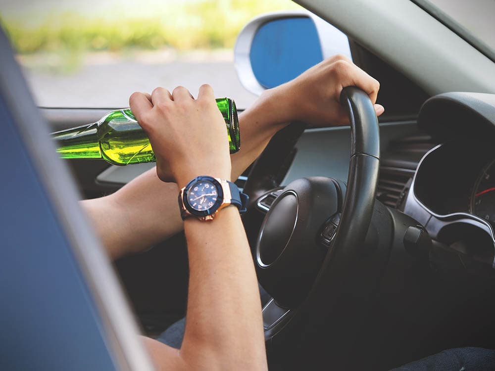 driver drinking beer