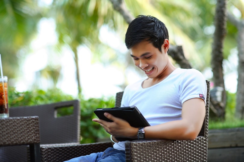 man working on tablet