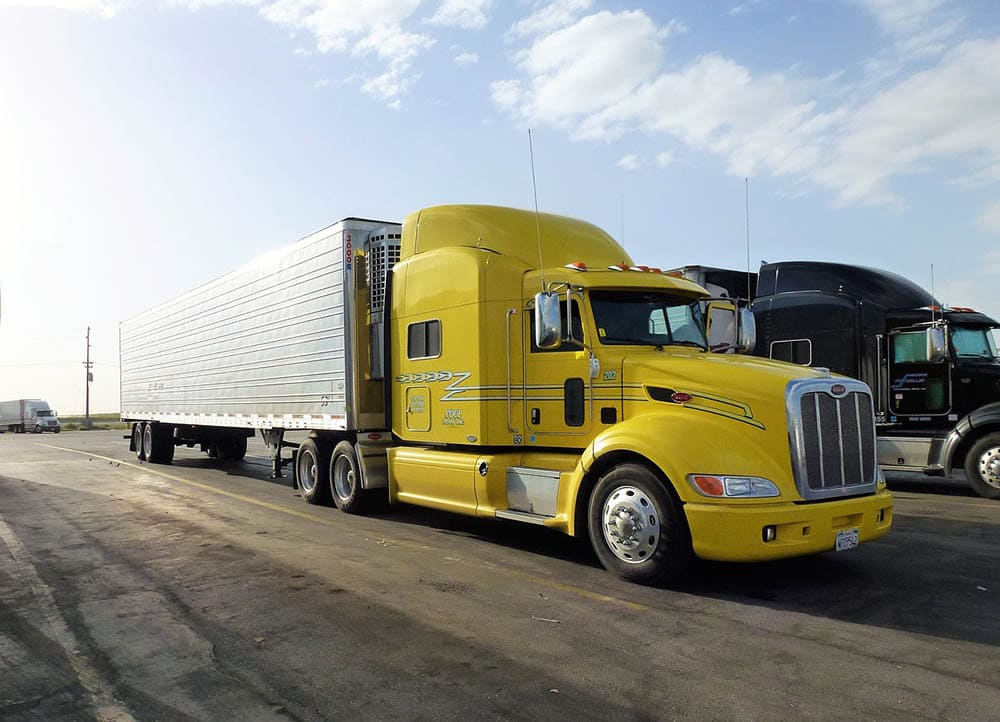 two trucks on the road