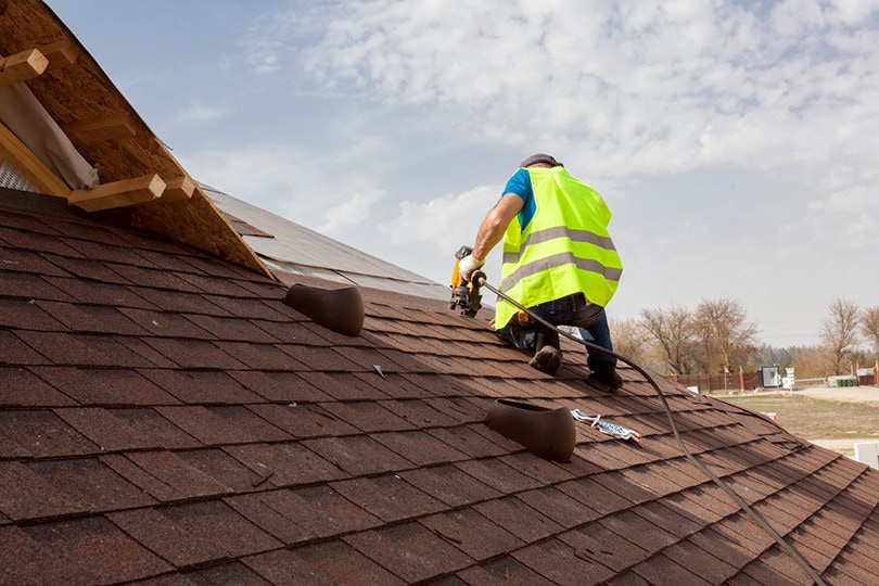 Man Working Asphalt roofing