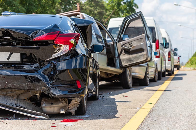 Modern car accident involving many cars on the road