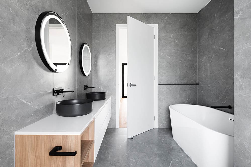 bathroom with two LED mirrors