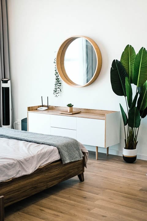 bedroom with engineered plank flooring