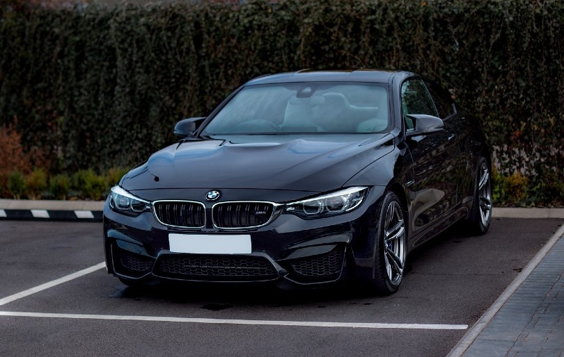 black bmw car in the parking lot