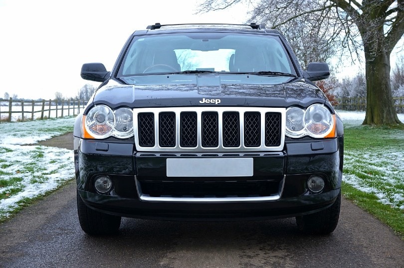black jeep ouside in the snow