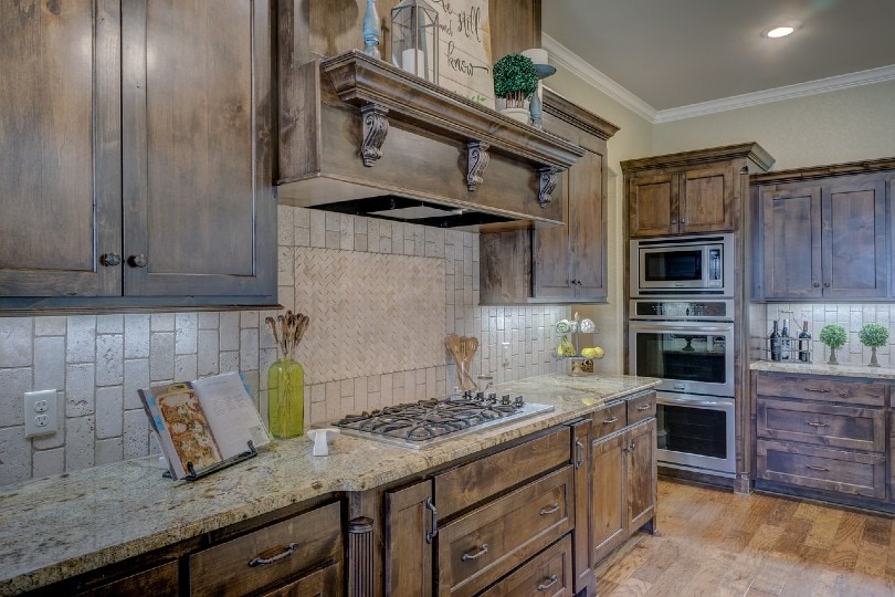 brick kitchen backsplash in a vintage inspired home