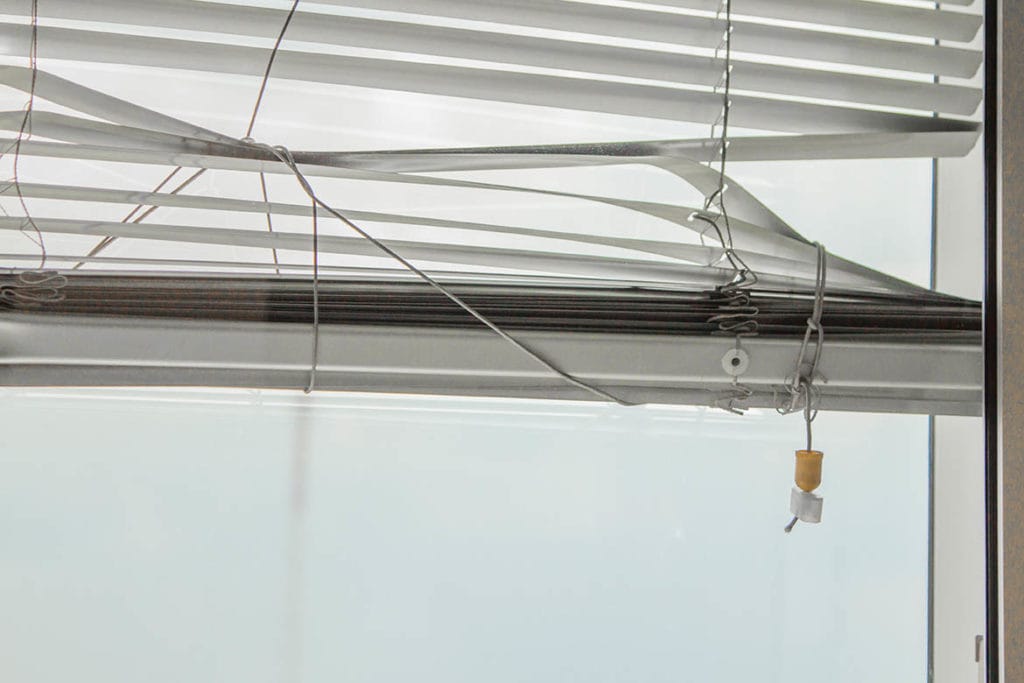 broken window blinds