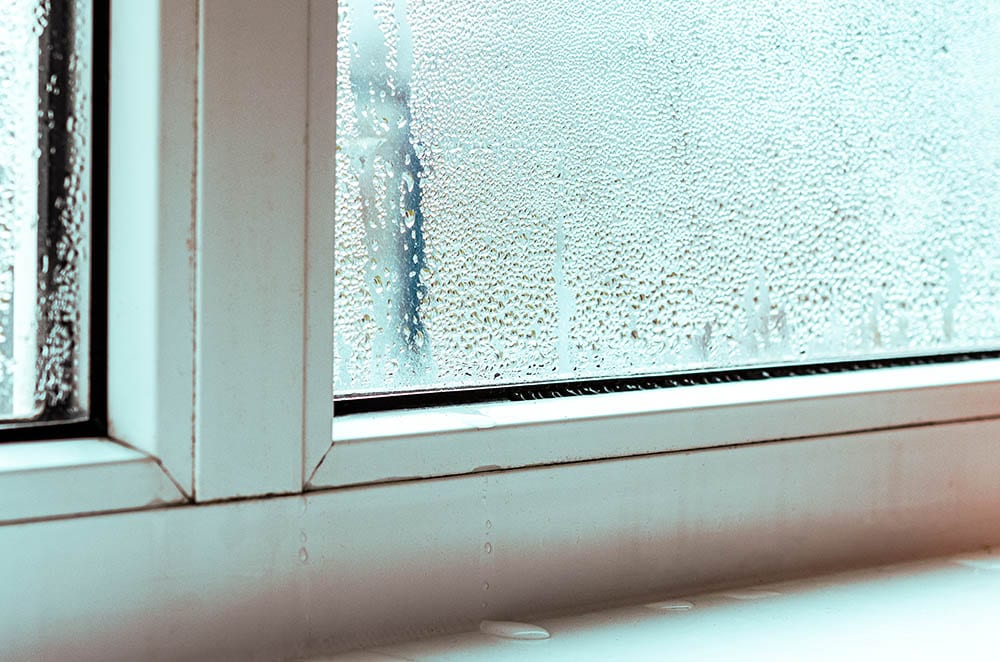 close up window with leak