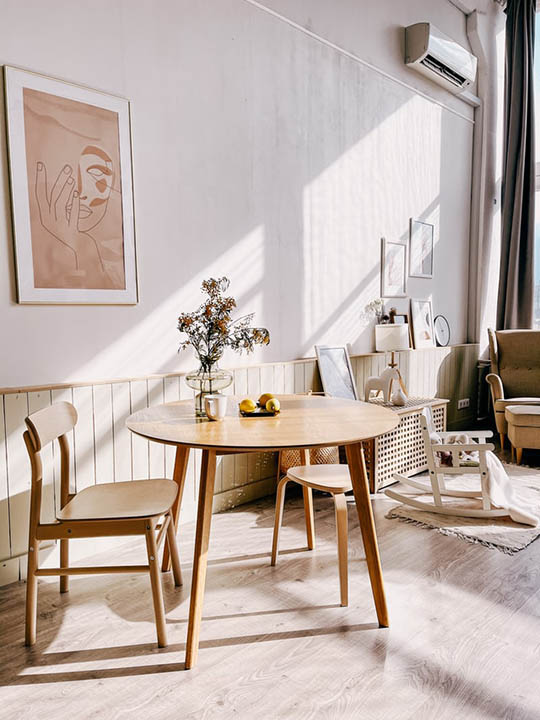 dining room with white wooden flooring