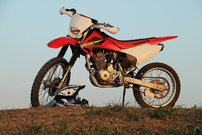 honda motorcycle parked on a hill