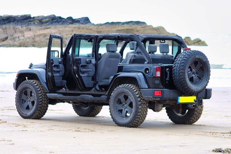jeep parked at the seashore