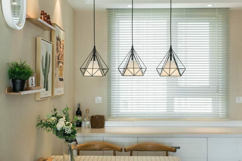 three artistic pendant lights