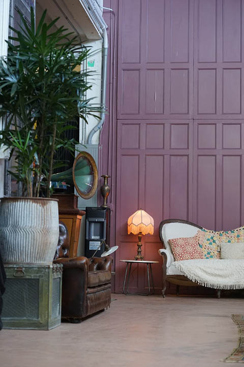 violet interior lounge area with high ceiling