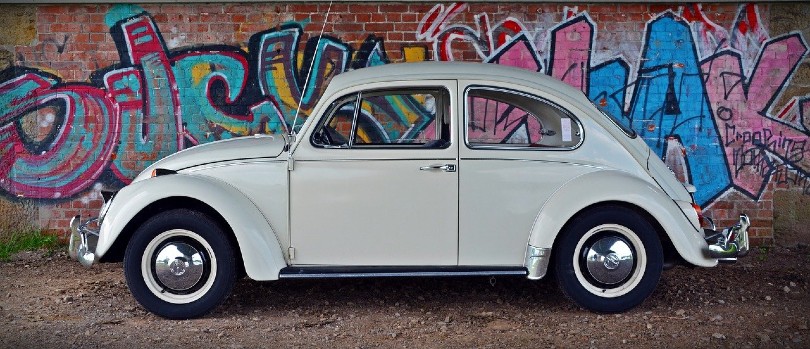volkswagen car with mural background