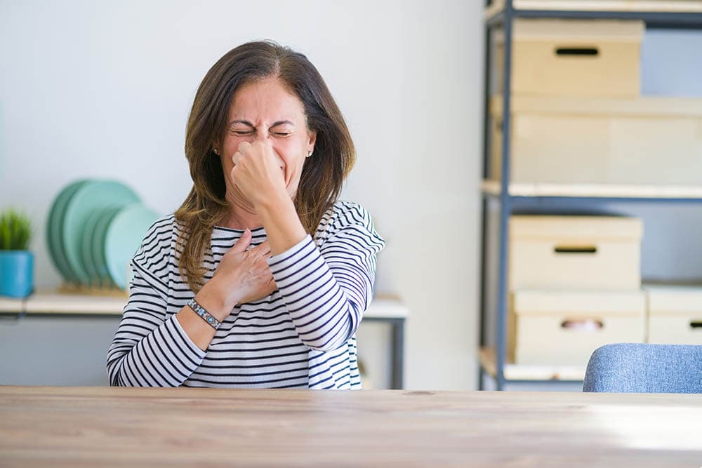 woman holding her breath