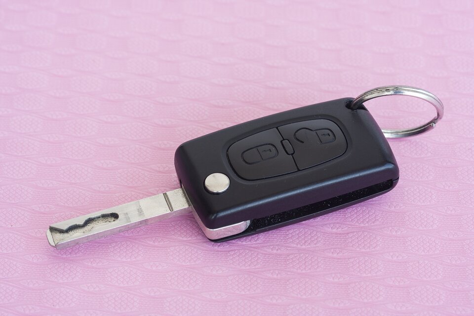Car Key on pink table