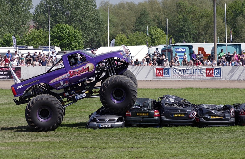 Monster Truck Crashing Cars